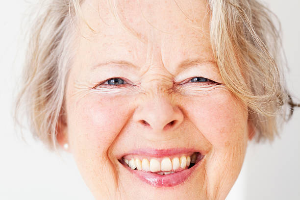 istock happy senior woman 180743587