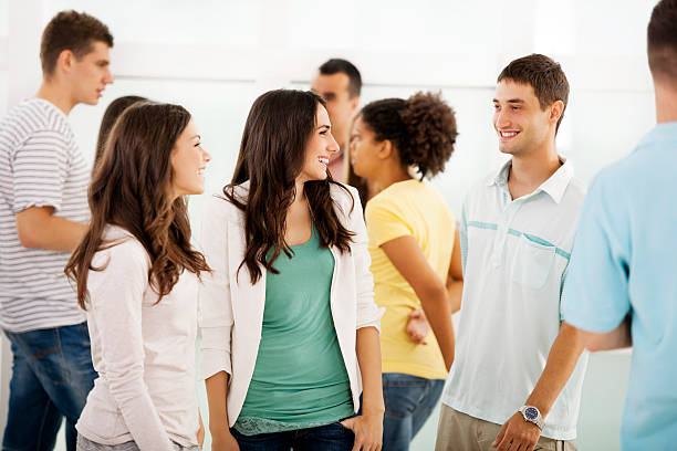 istock Group of teenagers talking. 180743784