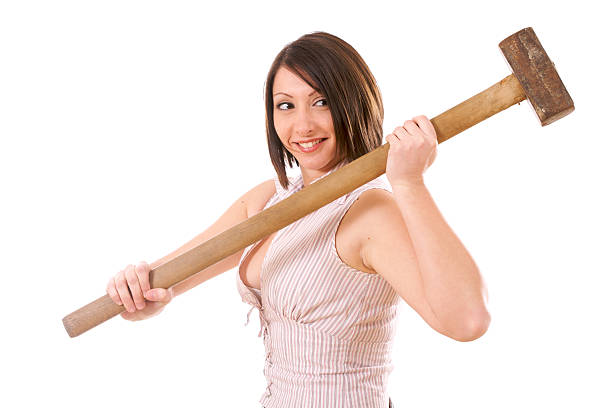 istock Woman holding big hammer 180743846