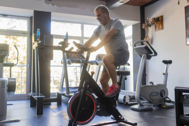 istock An elderly man is working out in the gym 1807448310