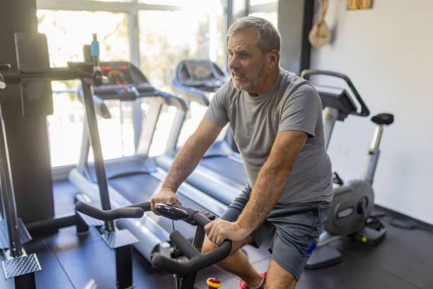 istock An elderly man is working out in the gym 1807448311