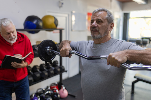 The older man exercise in the gym