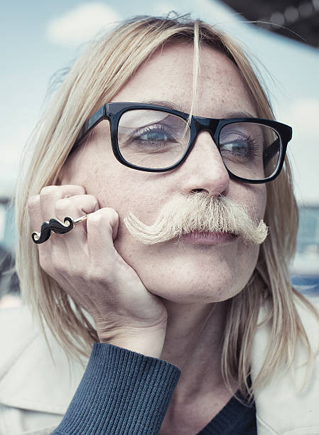 istock Attractive Blonde Woman with Moustache 180745162