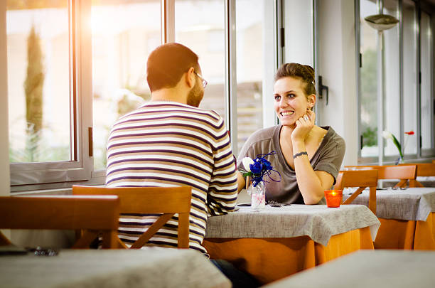 istock Young couple have lunch in a restaurant 180745239