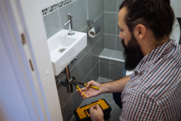 istock Handyman repairing bathroom pipes 1807453209