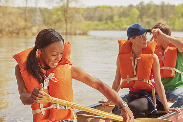 istock friends out on the canoe 180745493