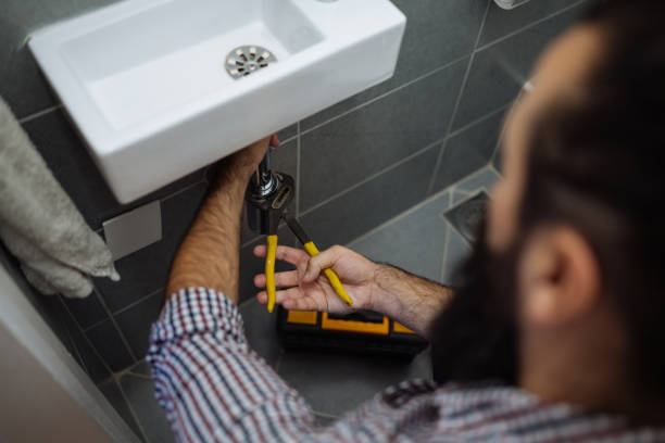 istock Handyman repairing bathroom pipes 1807455425