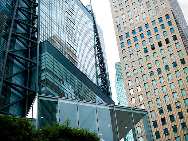 bill lined up - shimbashi district skyscraper building exterior low angle view foto e immagini stock