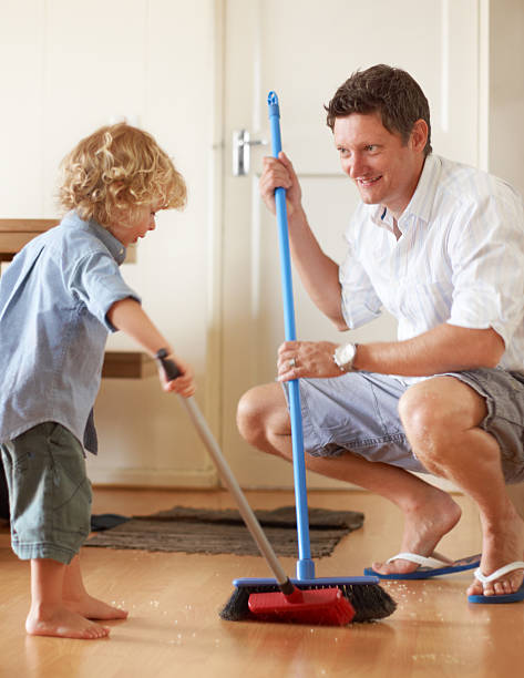 istock Boys making brooms toys 180745784