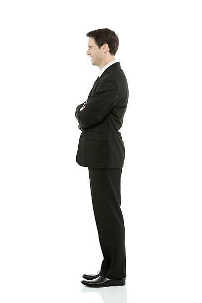 istock Smiling businessman standing with his arms crossed 180745973