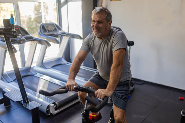 istock An elderly man is working out in the gym 1807468411