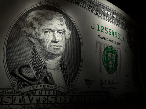 Two dollar bill with sharp focus and selective lights