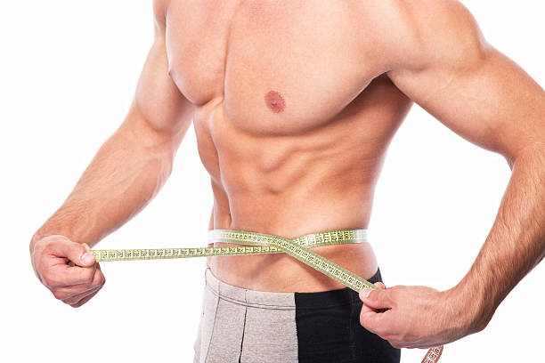 istock Man measuring his waist 180747487