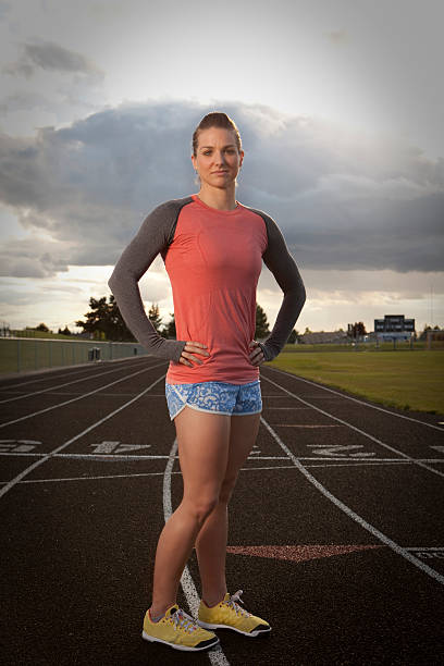 istock Fit and attractive woman at a track. 180747519