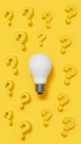 istock Multiple innovation questions for companies represented with a light bulb and ? sign on a yellow background. 1807475231