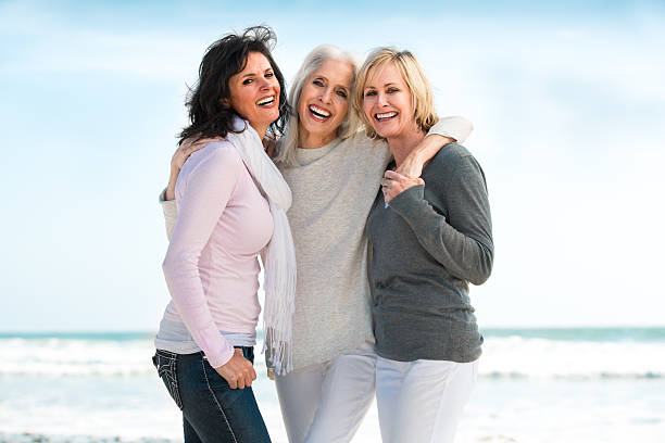 istock Three mature women smiling big 180748065
