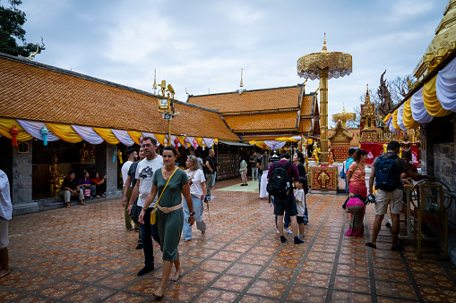People visit Wat Phra That Doi Suthep, a temple at Doi Suthep in Chiang Mai, Thailand.