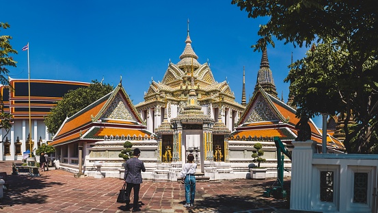 Bangkok, Thailand – November 02, 2022: Wat Phra Kaew in Bangkok is a sacred temple and it's a part of the Thai grand palace, the Temple that houses an ancient Emerald Buddha