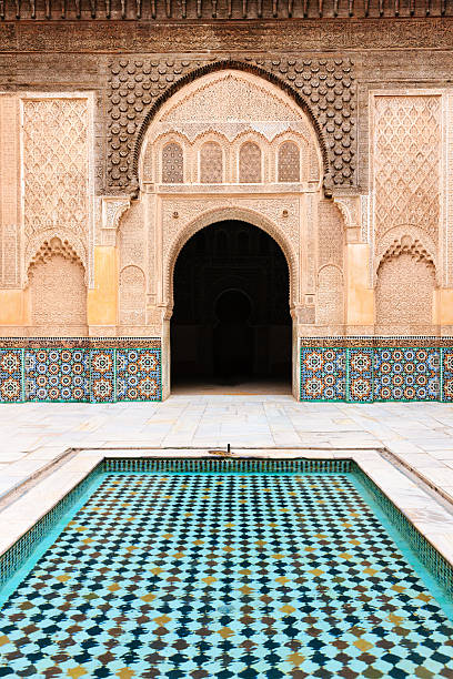 Inside of Madressa Ali Ben Youssef Marrakech Morocco "Inside of The Ali Ben Youssef Madrassa. The Ben Youssef Madrassa was an Islamic college in Marrakech, Morocco, North Africa. It is the largest Medrasa in all of Morocco." madressa photos stock pictures, royalty-free photos & images