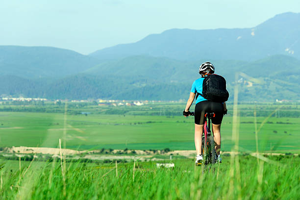 istock woman on bike 180748445