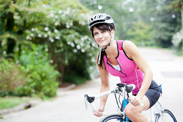 istock Woman Smiling with Bike 180748727