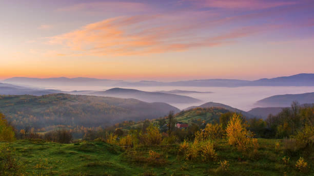 istock mountainous countryside landscape at dawn 1807488326