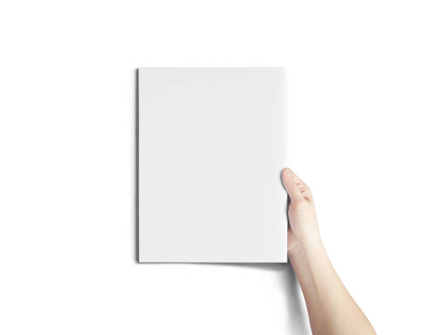 istock Hand Holding Vertical A4 Brochure Mockup 1807489402