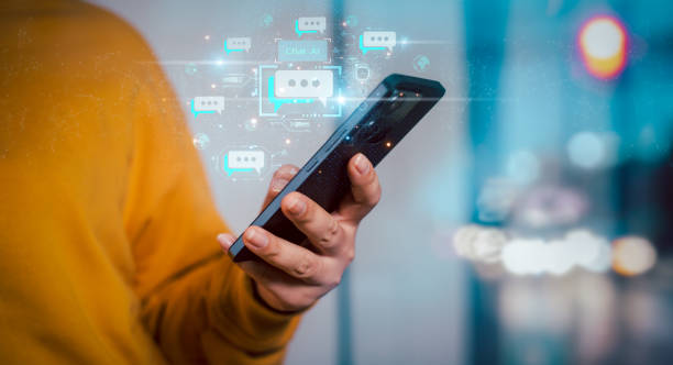 istock Businesswoman using chatbot AI in smartphone, Show virtual graphic, Global Internet connect, Chat with AI, Artificial Intelligence, Generative AI . Futuristic technology transformation. Chat with AI. 1807489584