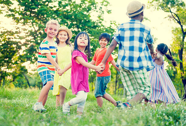 istock Children playing in the park 180749380