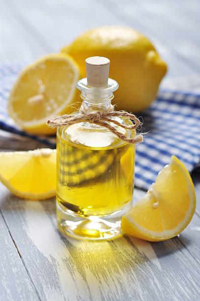 istock lemon oil in a glass bottle 180749693
