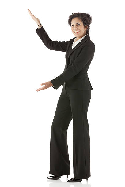 istock Attractive young smiling businesswoman gesturing 180750107