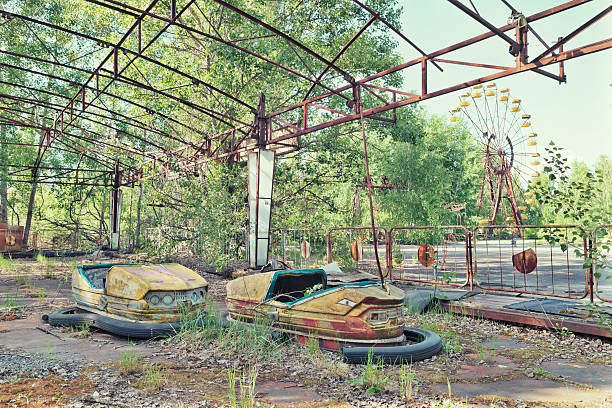 Abandoned Amusement Park of Pripyat, Ukraine "Pripyat that was the ninth nuclear city in the Soviet Union, for the Chernobyl Nuclear Power Plant is an abandoned city in northern Ukraine. It's vacated a few days after the 26 April 1986 Chernobyl disaster." chornobyl photos stock pictures, royalty-free photos & images