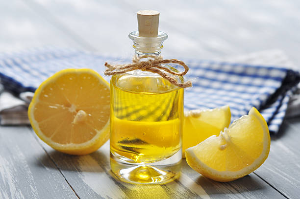 istock lemon oil in a glass bottle 180750487