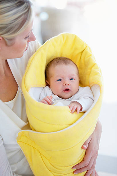 istock One swaddled baby! 180750860