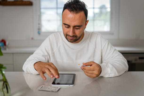 istock Young Adult man did not expect Hearing Aid at this age 1807509218