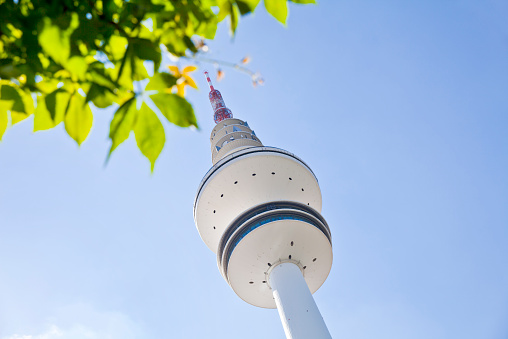 Radio telecommunication tower (Heinrich-Hertz-Tower) close to the public garden (Planten un Blomen).