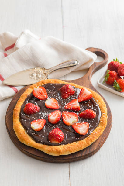 istock Homemade chocolate pizza with strawberries 1807517440