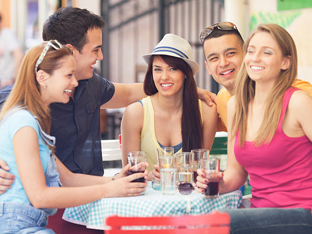 istock Young friends in a cafe 180752349
