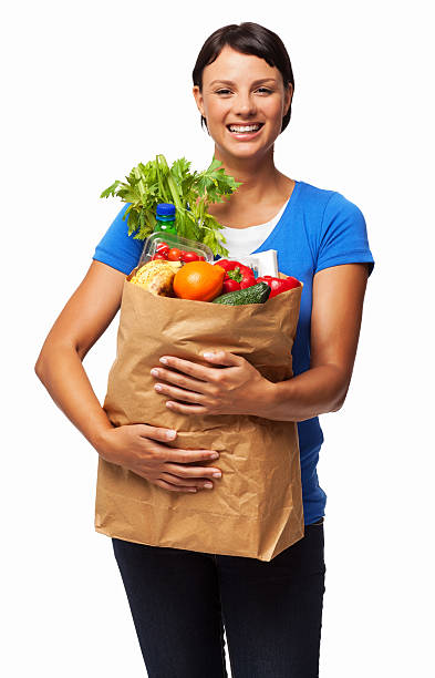 istock Happy Female Carrying Grocery Bag - Isolated 180752597