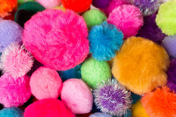 istock Art Craft Background: Close up of pompom colors and sizes 180753018