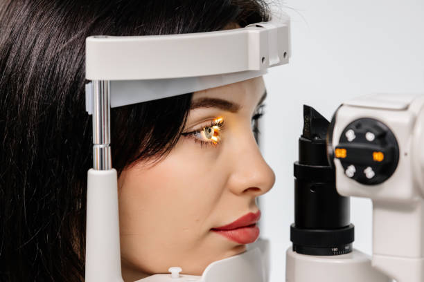 istock An ophthalmologist checks a young woman's vision using modern equipment. Concept for advertising ophthalmic services and medical technologies. 1807534942
