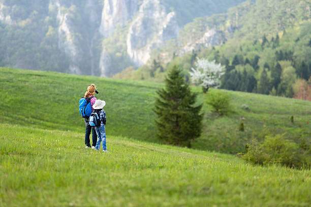 Mother and son hiking together