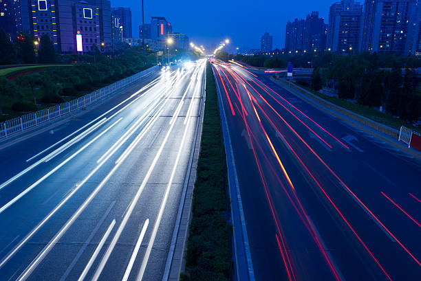 istock City night view Car taillight trajectory 180753664
