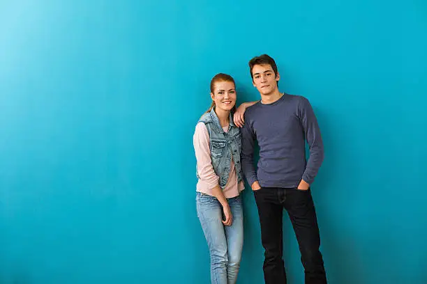 Photo of Two smiling teenagers