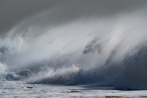 large breaking splashing waves during a storm in the Atlantic