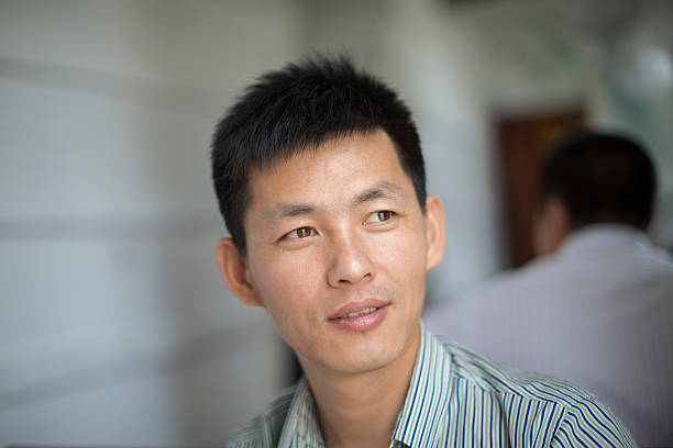 istock portrait of asian man 180754006