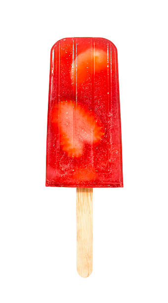 A homemade strawberry and banana popsicle on a wooden stick.