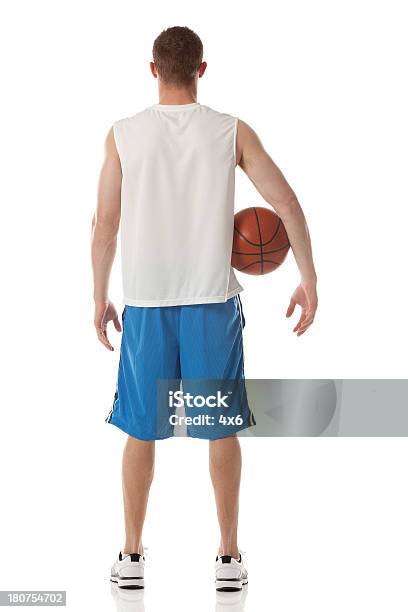 Rear View Of A Basketball Player Stockfoto en meer beelden van Mannen - Mannen, Onder de arm, Op de rug gezien