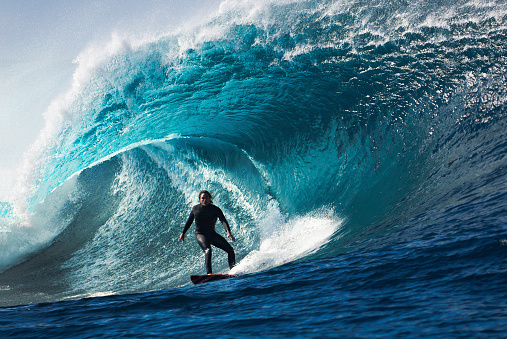 A young male surfer takes on a huge wave.This image is part of the Amazing Waves collection.