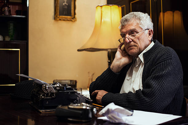 istock Wistful Retro Senior Man writer 180755932